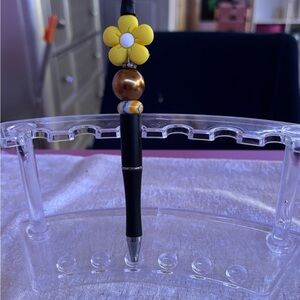 Yellow flower pen